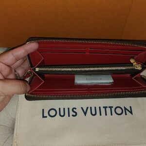 Damier Ebene Clemence wallet with cherry interior